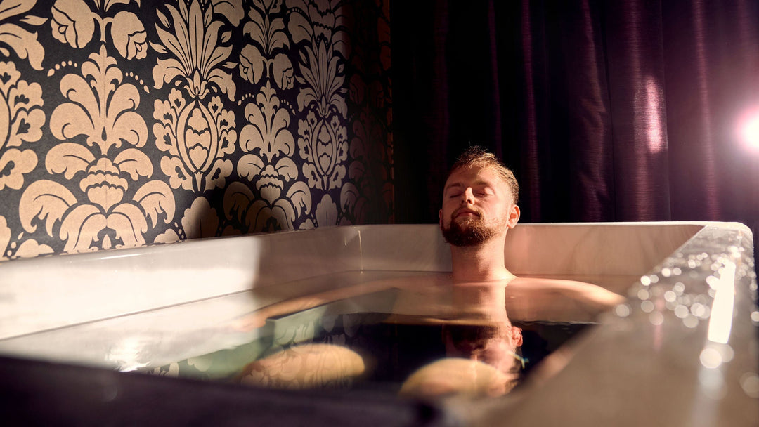 A man relaxing during a treatment at PURE Spa